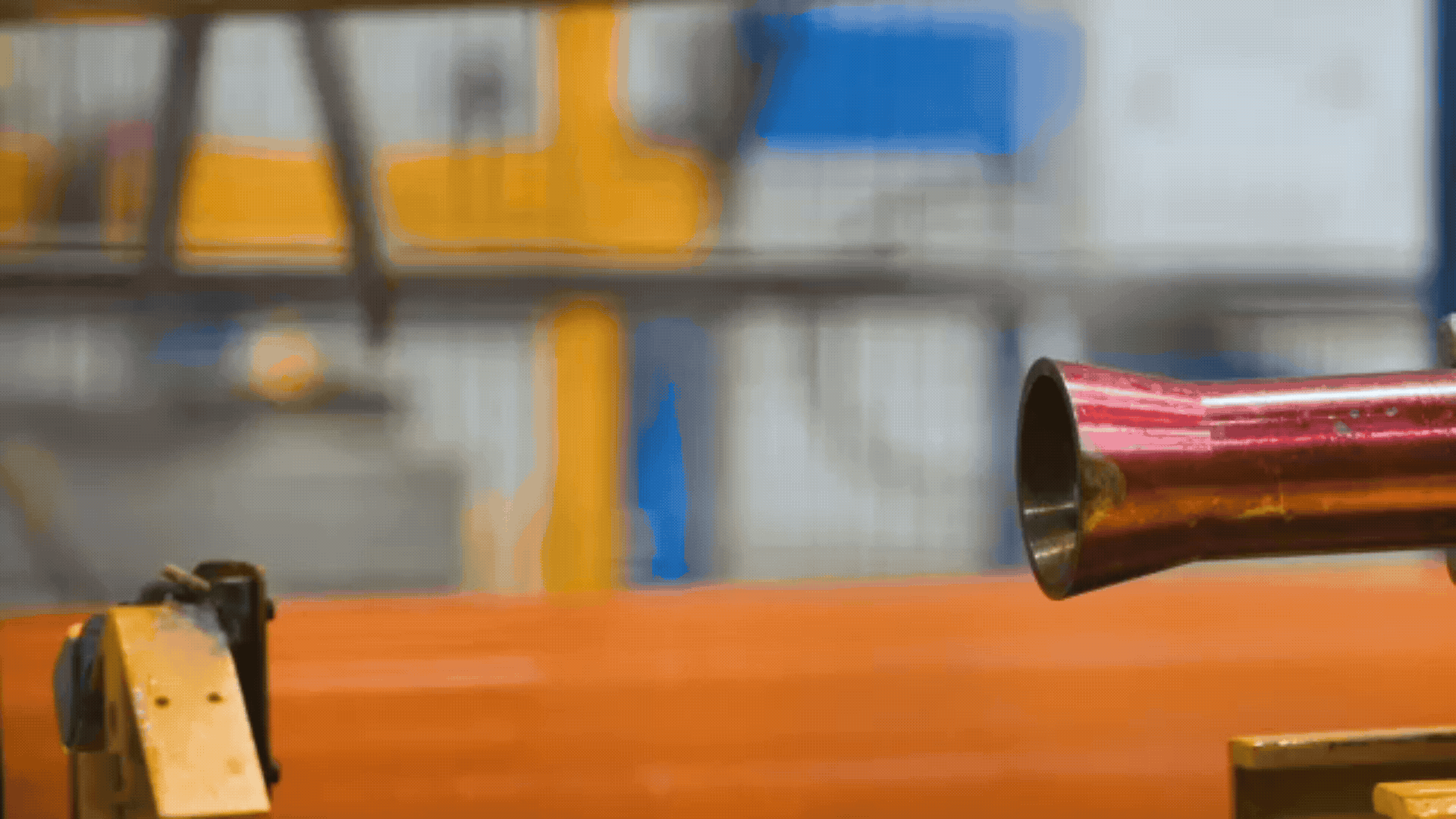 galvanized steel pipe being given a high-pressure steam blowout during the HDZ Coat galvanization process
